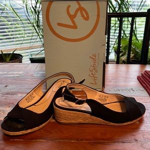 Stride Rite wedges 9W black with beige straw wedge.